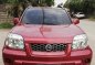 Selling Red Nissan X-Trail 2005 Automatic Gasoline -0