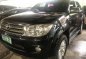 Black Toyota Fortuner 2010 at 58000 km for sale -1