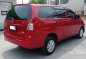 Red Toyota Innova 2013 at 83000 km for sale -3