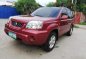 Selling Red Nissan X-Trail 2005 Automatic Gasoline -1