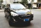 Black Hyundai Tucson 2011 at 37000 km for sale -1