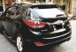 Black Hyundai Tucson 2011 at 37000 km for sale -4