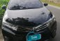 Sell Black 2015 Toyota Corolla Altis at 60000 km -5