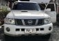White Nissan Patrol 2013 at 157000 km for sale -0