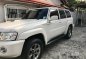 White Nissan Patrol 2013 at 157000 km for sale -1