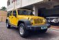Yellow Jeep Wrangler 2011 Automatic Gasoline for sale  -1