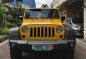 Yellow Jeep Wrangler 2011 Automatic Gasoline for sale  -0