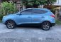 Selling Blue Hyundai Tucson 2014 at 100000 km-7