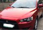 Selling Red Mitsubishi Lancer ex 2010 at 91000 km-1