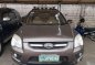 Brown Kia Sportage 2009 for sale in Cainta -1