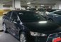 Selling Black Mitsubishi Lancer 2012 in Caloocan-1