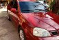 Red Chevrolet Optra 2004 for sale in Manual-2