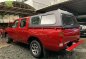 Red Nissan Frontier Navara 2009 for sale in Quezon City -4