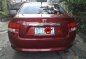 Red Honda City 2009 at 97000 km for sale -2