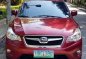Red Subaru Xv 2013 at 56000 km for sale -0