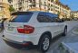 White Bmw X5 2009 at 61000 km for sale -2