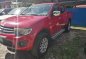 Red Mitsubishi Strada 2011 at 67000 km for sale -3