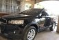 Selling Black Chevrolet Captiva 2014 at 24800 km-0