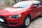 Selling Red Mitsubishi Lancer Ex 2010 Automatic Gasoline -0