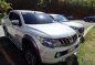 White Mitsubishi Strada 2017 for sale in Silang-2