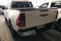 Selling White Toyota Hilux 2018 in Quezon City-2