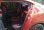 Red Honda City 2009 at 97000 km for sale -4