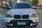 White Bmw X5 2009 at 61000 km for sale -0