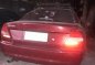 Selling Red Mitsubishi Lancer 1997 Manual Gasoline -1