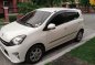Pearlwhite Toyota Wigo 2014 for sale in Malolos-2