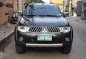 Sell Black 2009 Mitsubishi Montero sport in Quezon City-0