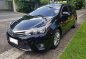 Black Toyota Corolla altis 2015 for sale in Manual-2
