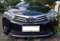 Black Toyota Corolla altis 2015 for sale in Manual-0