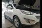 Selling White Hyundai Tucson 2012 in Malolos-0