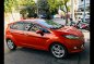 Orange Ford Fiesta 2013 Hatchback for sale in Quezon City-2