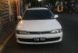 Sell White 1994 Mitsubishi Lancer in Bacoor-1