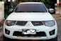White Mitsubishi Strada 2010 for sale in Taguig-0