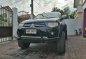 Sell Black 2012 Mitsubishi Strada in Bamban-0