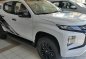 Sell White 2020 Mitsubishi Strada in Quezon City-1