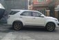 Pearl White Toyota Fortuner 2013 for sale in Quezon City-0