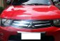 Red Mitsubishi Strada 2012 Truck for sale in Talisay City-0