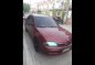 Sell Red 2001 Ford Lynx Sedan in Mabalacat-0
