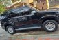Black Toyota Fortuner 2013 SUV / MPV for sale in Quezon City-0