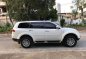 Pearl White Mitsubishi Montero Sport 2013 for sale in Quezon City-1