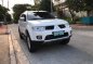 Pearl White Mitsubishi Montero Sport 2013 for sale in Quezon City-0