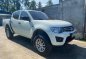 Sell White Mitsubishi Strada in Lipa-0