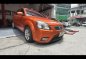 Selling Orange Kia Rio 2010 Sedan in Manila-0