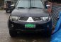 Black Mitsubishi Strada 2013 for sale in Baguio City-2