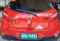 Selling Red Mazda 2 in Manila-9