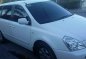 Sell White Kia Grand carnival in Angeles-1