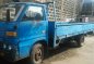 Blue Isuzu Elf for sale in  Makati City-0